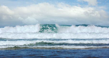 Sea storm wave. Misty seascape view from beach.