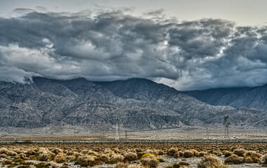 landscape with mountains and heavy clouds