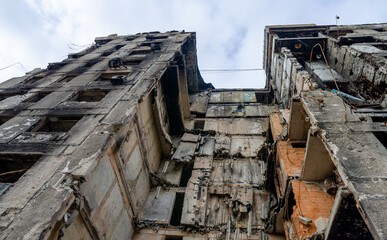 destroyed and burned houses in the city during the war in Ukraine