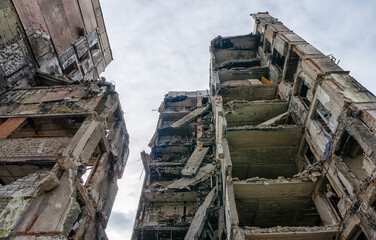 destroyed and burned houses in the city during the war in Ukraine