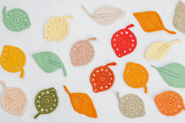 Set of clew of thread for knitting. Crocheted different leaves, handmade, autumn hobby concept