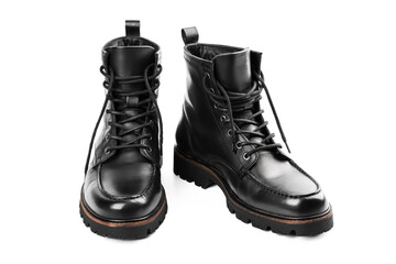 Pair of black leather boots, dress boots for men, men ankle high boots. Black brogue boots on a...