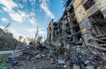 destroyed and burned houses in the city during the war in Ukraine