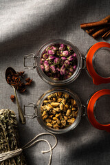 Rose buds in hinged lid jars, high angle view, directly above shot