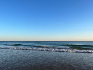 Tender blue sea horizon, blue sea and blue sky, evening light