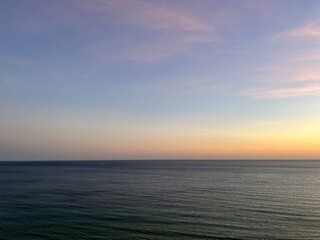 Natural sunset sea background, sunset sea horizon, quiet and peaceful