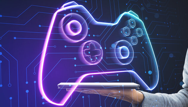 Close up of female hand holding tablet with creative joystick or gamepad hologram on blurry background. Esport, gaming and fun concept.