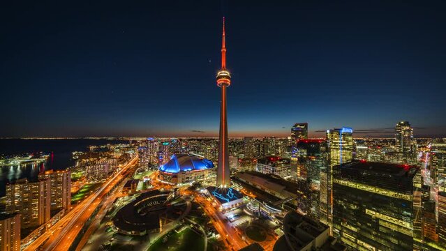 Day to night, zoom out timelapse view of Toronto cityscape in Toronto, Ontario, Canada, establishing shot, business and finance concept.