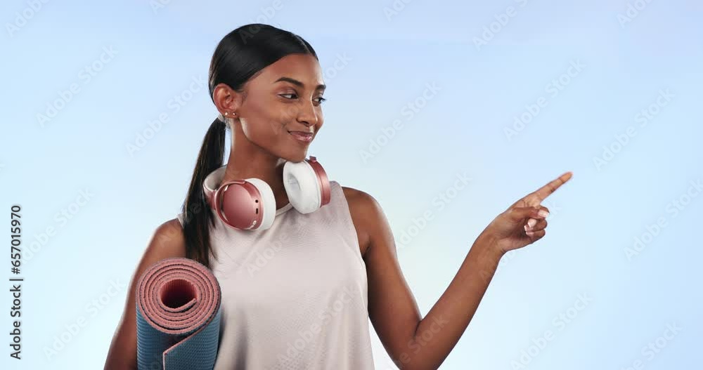 Wall mural headphones, pointing and woman face with fitness steps, workout and exercise with music in studio. h