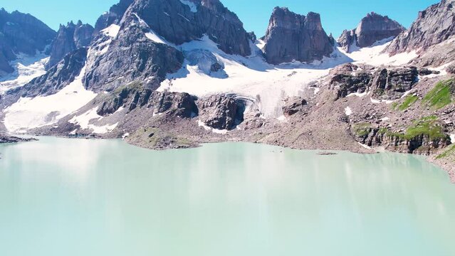 Lake with a reflection of Mountain cliffs in the water - Chitta katha lake Neelum Valley Kashmir, Himalayan mountain range