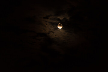 moonlight in the night and illuminated clouds