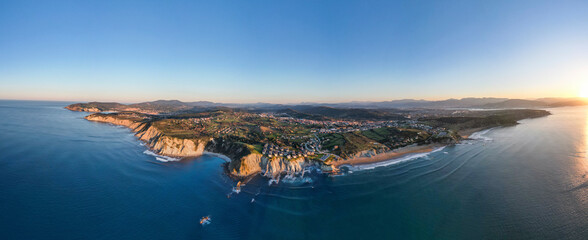 Picturesque view of calm sea with green coast