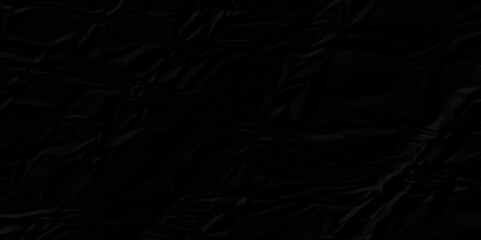 Black crumpled paper texture. Black crumpled paper texture sheet background. Wrinkled paper texture.