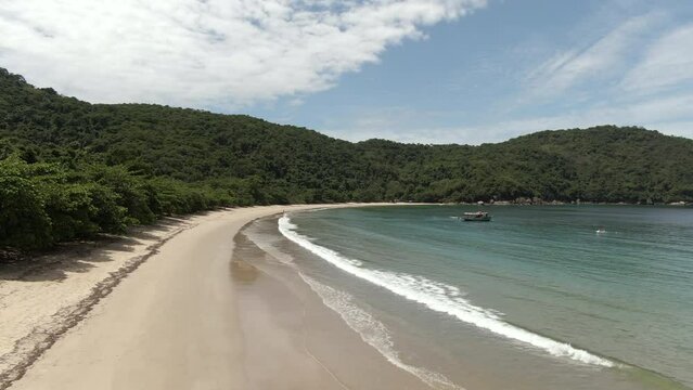 Aerial view of pristine secluded beach and lush rainforest in Ilha Grande island, Angra dos Reis, Rio de Janeiro State, Brazil. 