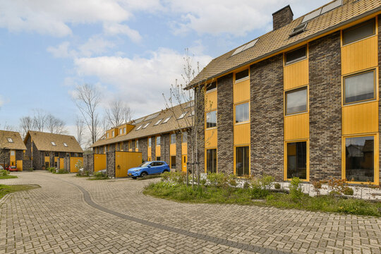 Facade Of Residential Building With Sky In Background