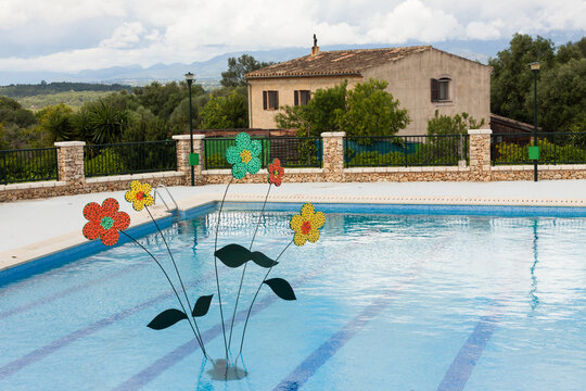 Flower decoration in the swimming pool on "Costitx en Flor" (Costitx in bloom) Flower Fair, Majorca, Spain