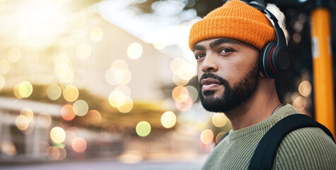 Bokeh, music headphones and man thinking outdoor, listening to audio or sound on internet in city...
