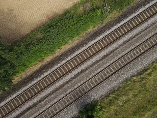 Zelfklevend Fotobehang Aerial view of railroad tracks in the landscape  © Mentor