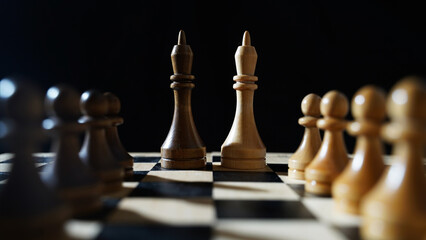 Conflict. Conversation, discussion. Сhess pieces on the board. Black background