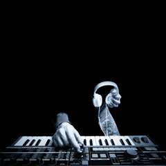 musician hands playing keyboard synthesizer and holding headphone. black and white. music concept - 657115750