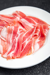 bacon slice fresh smoked meat eating cooking appetizer meal food snack on the table copy space food background rustic top view