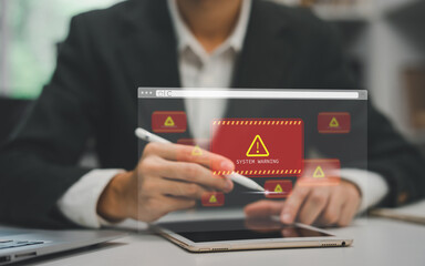 developer using computer laptop with triangle caution warning sign for notification error and maintenance concept. Computer virus detected, network security and maintenance concept.
