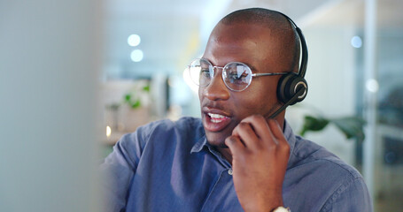 Black man, call center and consulting with headphones in customer service, support or telemarketing...