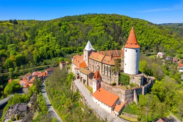Fotobehang Aerial view of castle Krivoklat in Czech republic, Europe. Famous Czech medieval castle of Krivoklat, central Czech Republic. Krivoklat castle, medieval royal castle in Central Bohemia, Czechia. © daliu