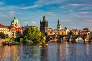 Charles Bridge sunset view of the Old Town pier architecture, Charles Bridge over Vltava river in...