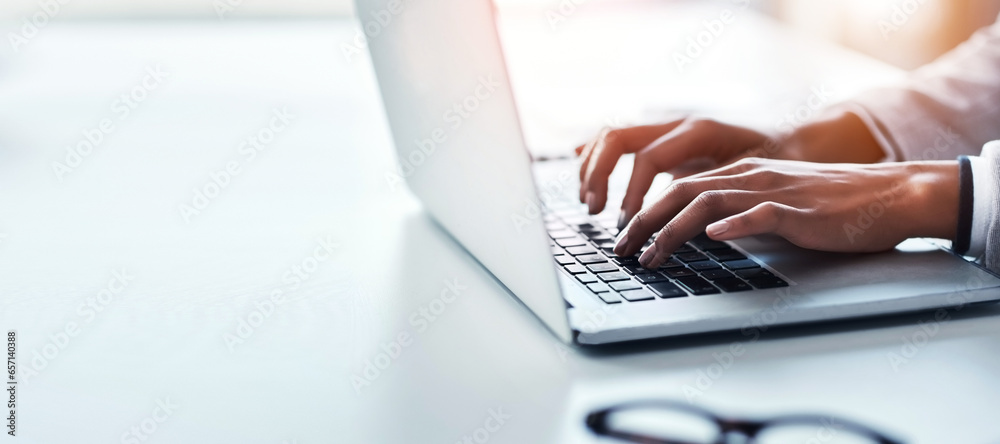 Aufkleber Hands, laptop and a business woman typing on space in the office while working on a report or research. Computer, mockup and flare with a professional employee closeup at a desk in the workplace