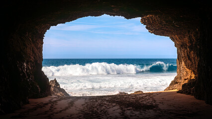 A cave at the beach of Playa de la Solapa on the west coast of the island of Fuerteventura in Spain