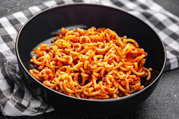 pasta bolognese tasty sedanini rigati tomato sauce eating cooking appetizer meal food snack on the table copy space food background rustic top view