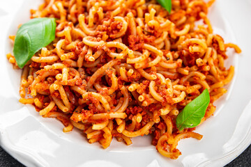 pasta bolognese tasty sedanini rigati tomato sauce eating cooking appetizer meal food snack on the table copy space food background rustic top view