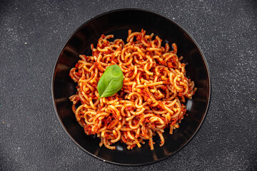 pasta bolognese tasty sedanini rigati tomato sauce eating cooking appetizer meal food snack on the table copy space food background rustic top view