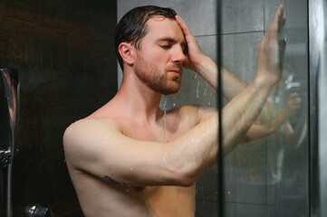 Man warming up in the shower