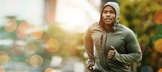 Fitness, bokeh and black man running outdoor, exercise or training healthy body in the morning in...
