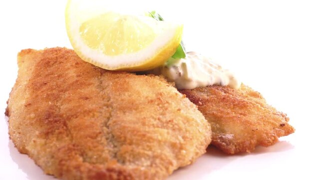 Fried Fish Fillet - Food on a turntable isolated on white background