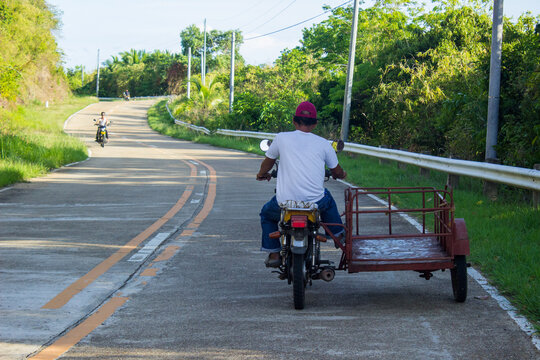 Biker with tricycle on Philippines