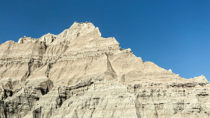 Badlands Rock Formations against a Blue Sky