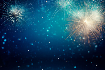 Fototapeta premium Fireworks at New Year with copy space on blue background