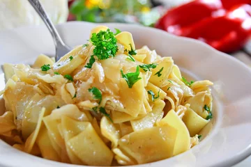 Fotobehang Krpice sa zeljem - Croatian pasta with caramelized cabbage  © kkavve
