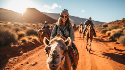 Tourists Delight in Group Camel Rides through the Desert Travel, 