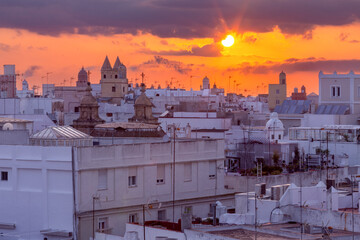 Picturesque sunset over the rooftops of Spanish Cadiz.