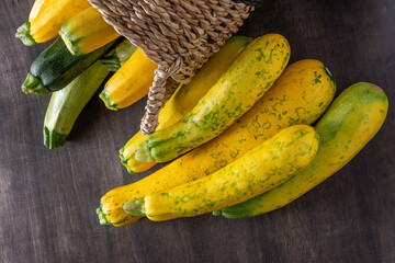 Yellow green leopard spotted zucchini. Vegetables on the table. vegetable marrow harvest. Food...