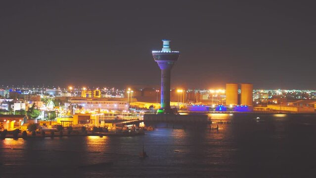 4k, Aerial view panorama night city and port Lighthouse, Yanbu, Saudi Arabia