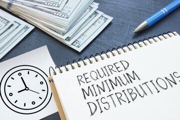 Required minimum distributions RMD is shown using the text and photo of dollars