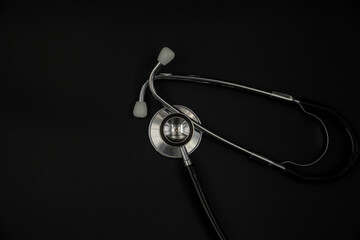 black stethoscope on white background