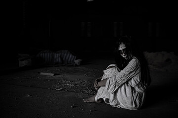 Portrait of asian woman make up ghost face,Horror scene,Scary background,Halloween poster
