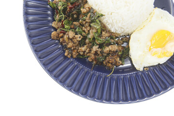 Stir fried Thai basil with minced pork and a fried egg isolated on white background.