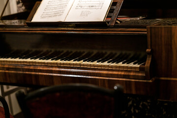 Vintage old piano in the house of the Russian writer.